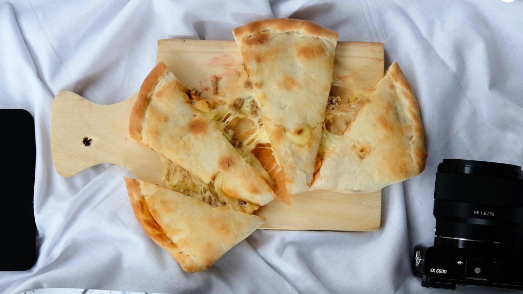 Panties Pizza On A Wooden Cutting Surrounded By With White Napkind Is So Amaze Me Panties Pizza is different, we are unique